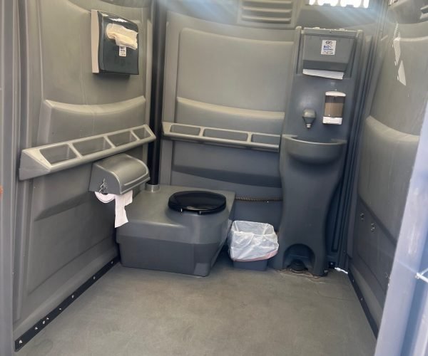 ADA-Porta-Potty.--rotated-qy15skwub6oqemt875a8tvs40jv6eq2zqxybamp66g